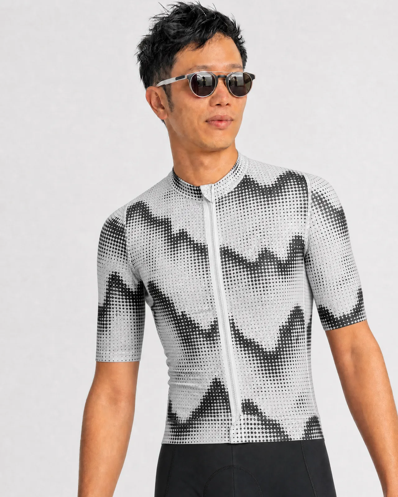 Jersey Geometric Pattern, front three-quarter view, rider wearing sunglasses